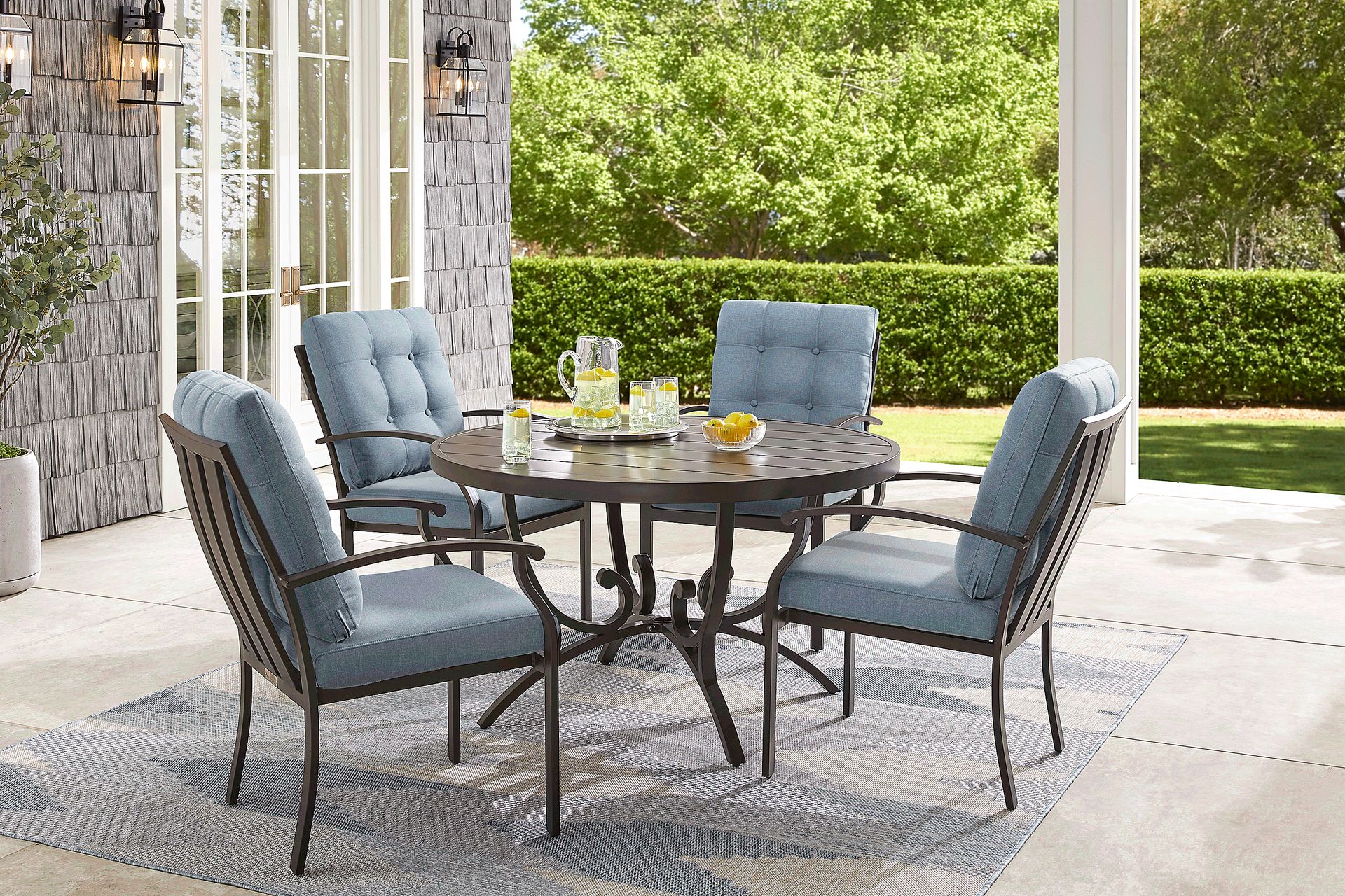 Lake Breeze Aged Bronze 5 Pc Round Outdoor Dining Set with Blueberry Cushions - Image 1