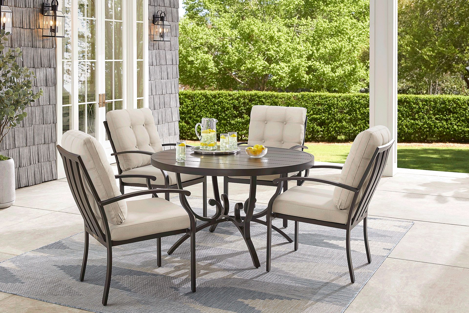 Lake Breeze Aged Bronze 5 Pc Round Outdoor Dining Set with Desert Cushions - Image 1