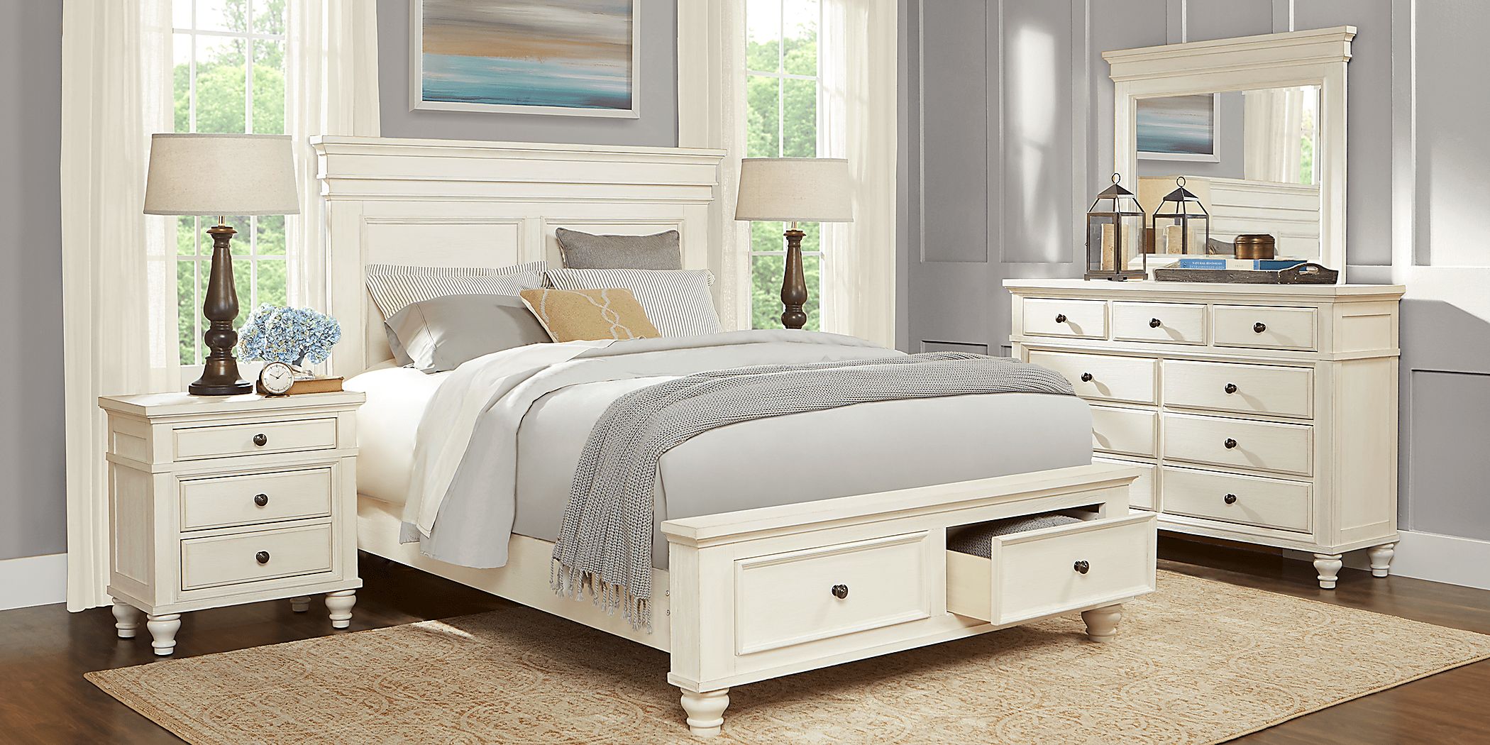 https://assets.roomstogo.com/product/lake-town-off-white-7-pc-king-panel-bedroom-with-storage_3387155P_image-room?cache-id=cdc9c5bc24a2c7fb86bce2fc73931a3b