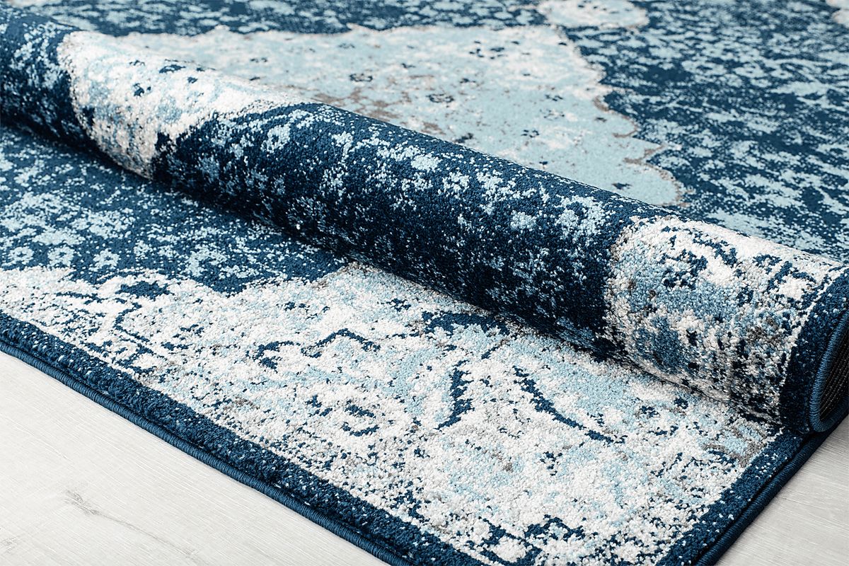 Lestine Dark Blue Rug | Rooms to Go
