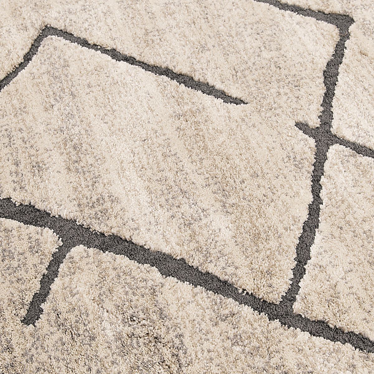 Lowy Pebble Beige Rug | Rooms to Go