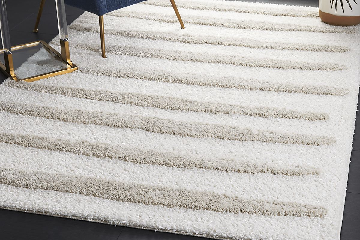Madeleine Softee Ivory Beige Polyester Fabric Rug | Rooms to Go