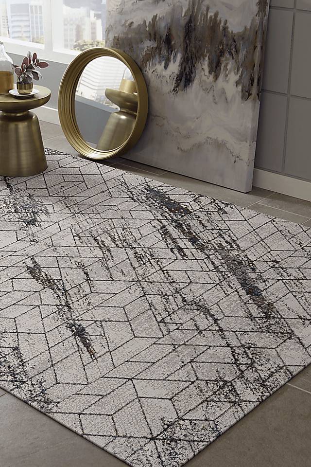 Melicord Ivory 6'7 x 9'6 Rug - Thumbnail - Image 2