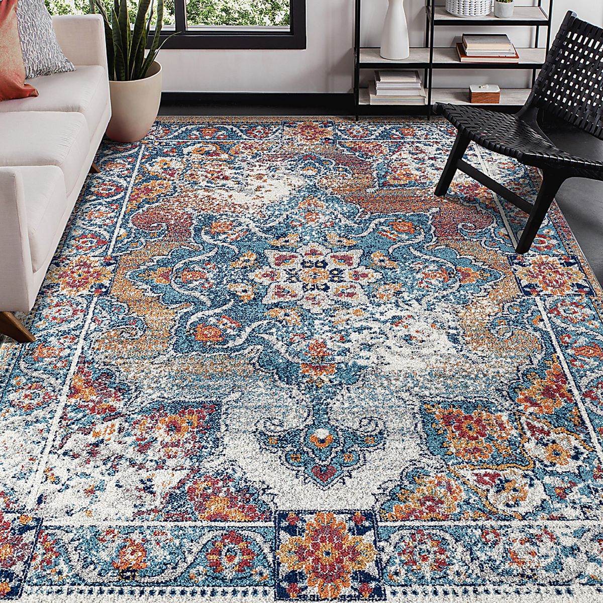 Melidon Orange Orange,Red Rugs | Rooms to Go