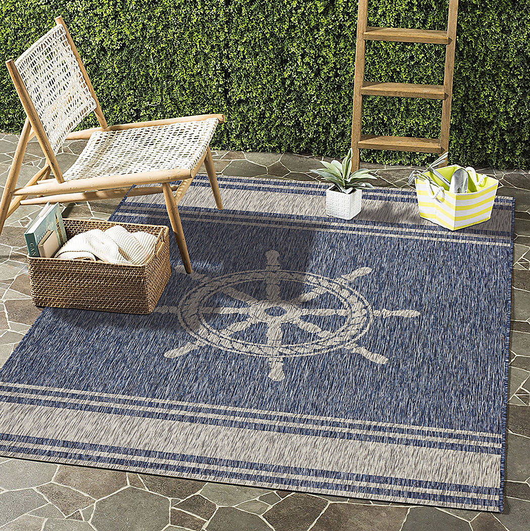 photo of blue blue rug with nautical theme