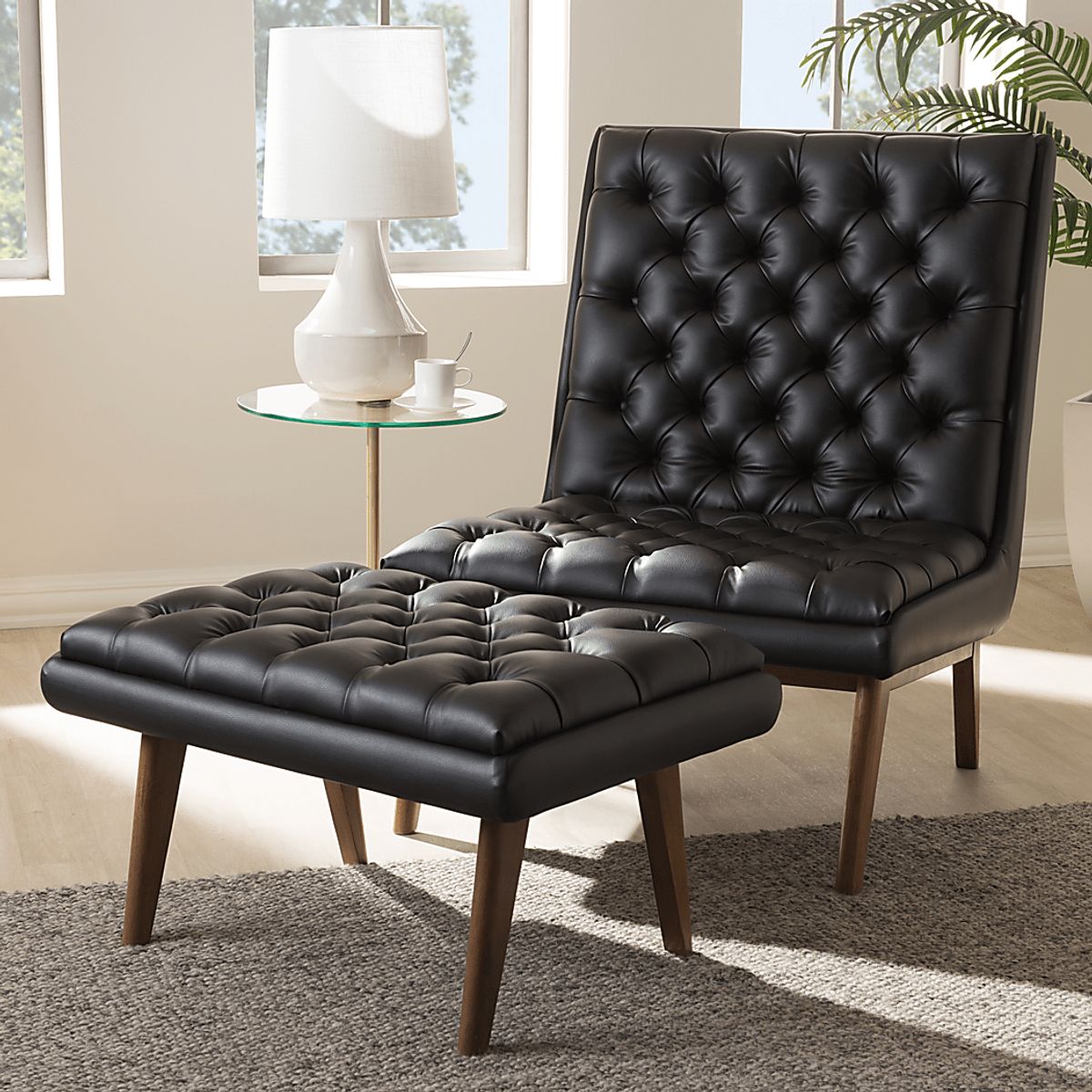 Minneha Black Polyester Fabric Chair & Ottoman | Rooms to Go