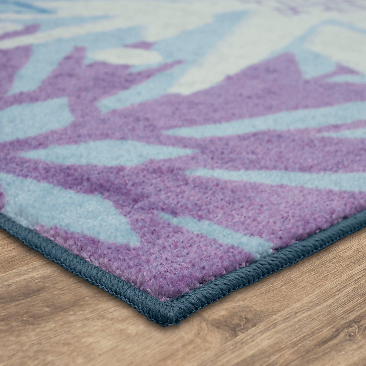 Disney Montage Of Snowflakes Blue Rug | Rooms to Go