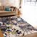 Nadelyn Cream 7'10 x 10' Rug