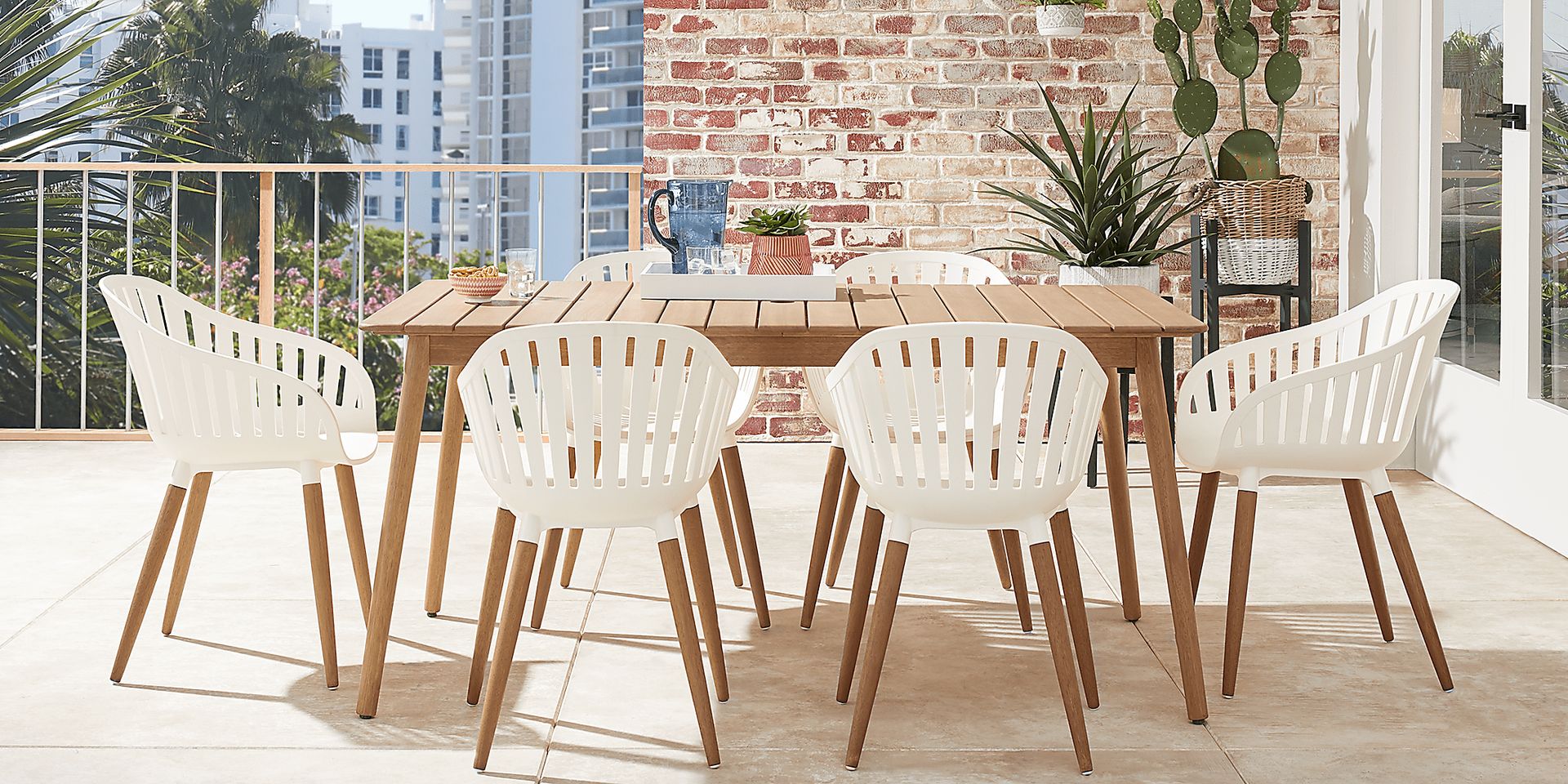 Nassau 7 Pc Outdoor Dining Set with White Chairs - Image 1