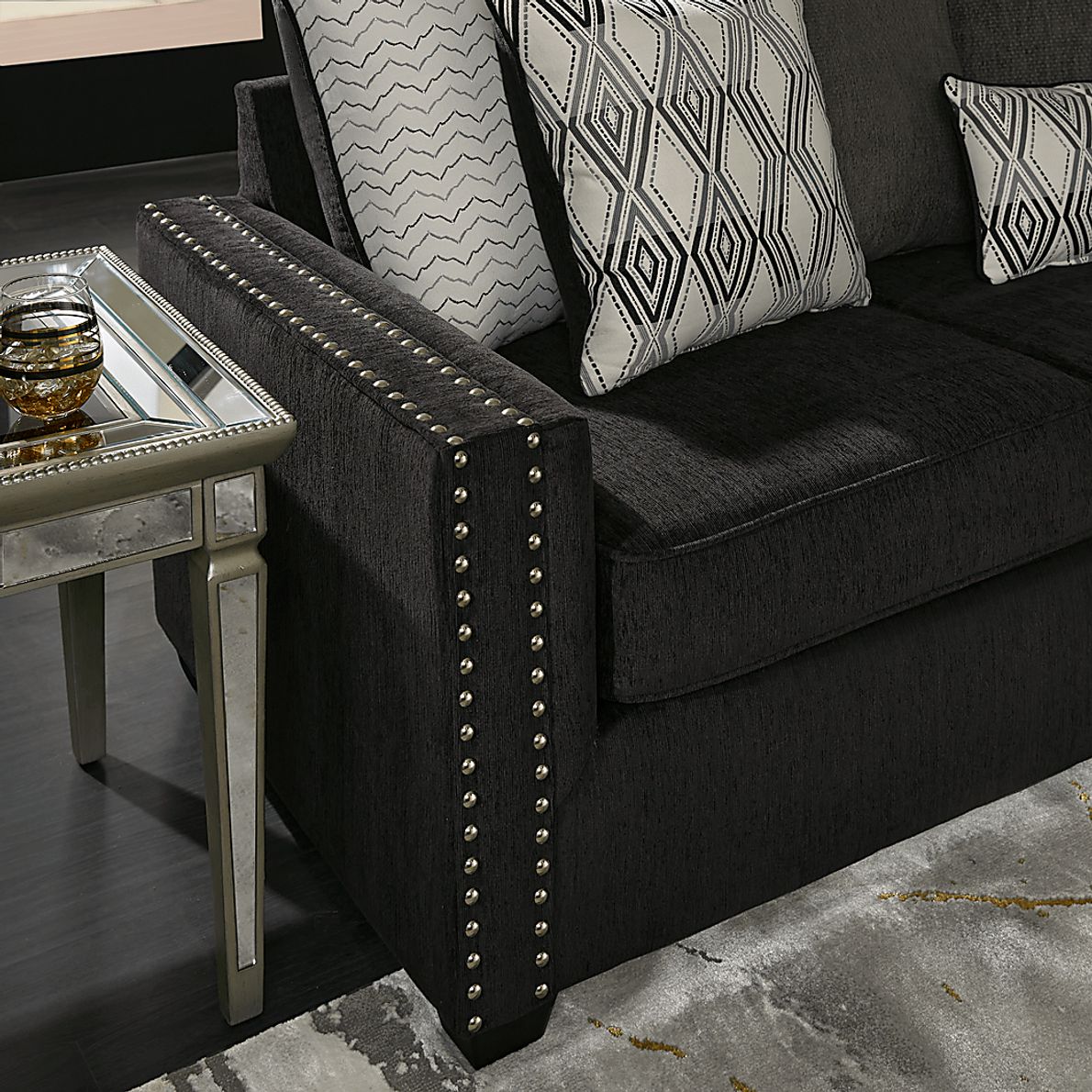 Natalia Black 7 Pc Living Room with Gel Foam Sleeper Sofa Rooms To Go