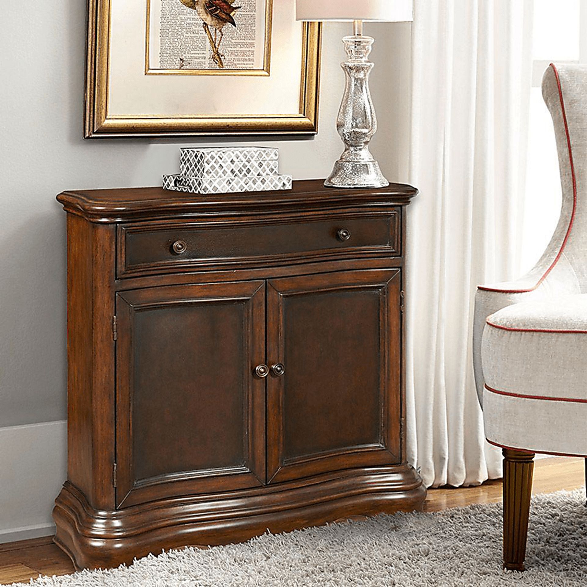 Odingsell Brown Dark Wood Accent Cabinet | Rooms to Go