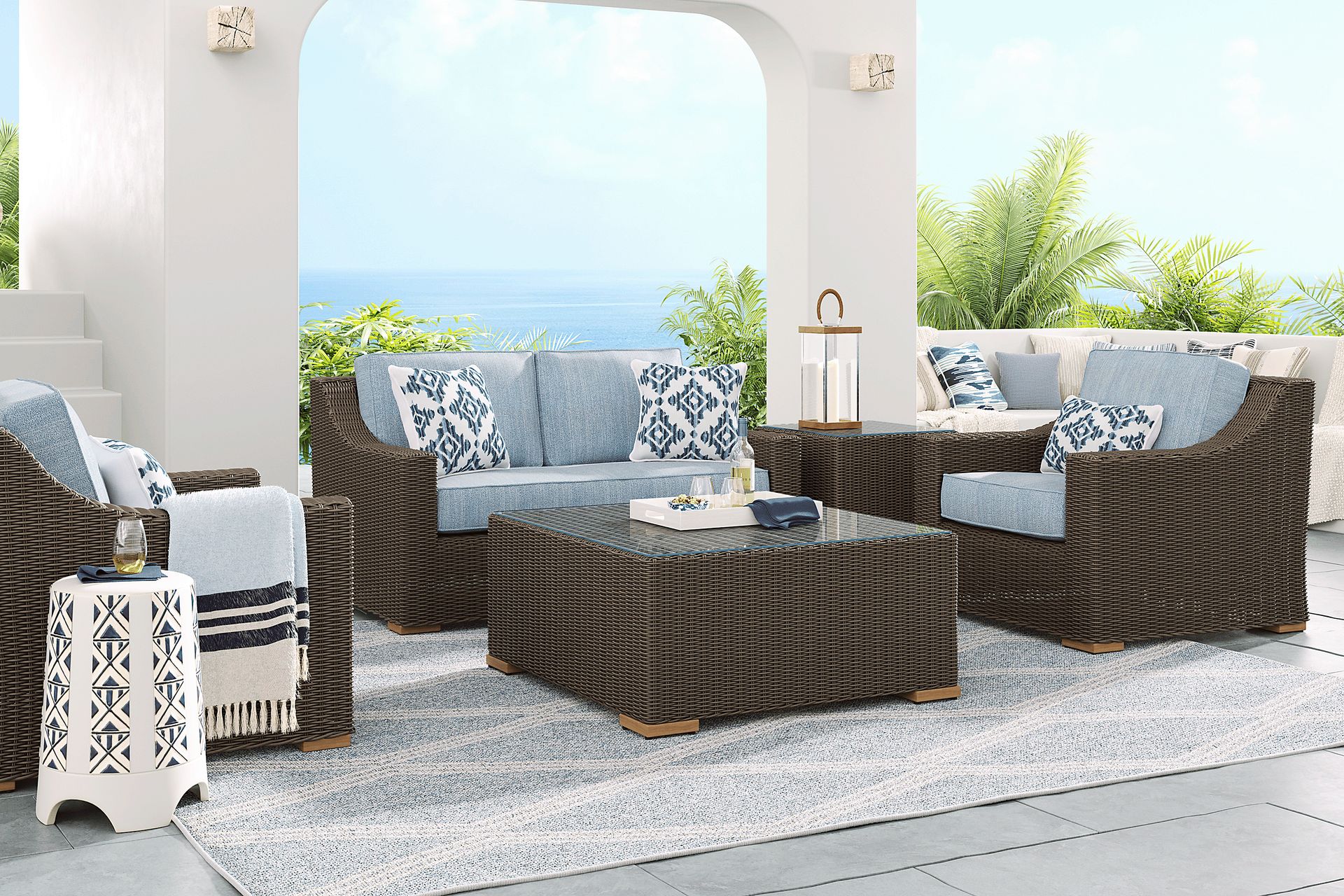 Patmos Brown 4 Pc Outdoor Loveseat Seating Set with Steel Cushions - Image 1