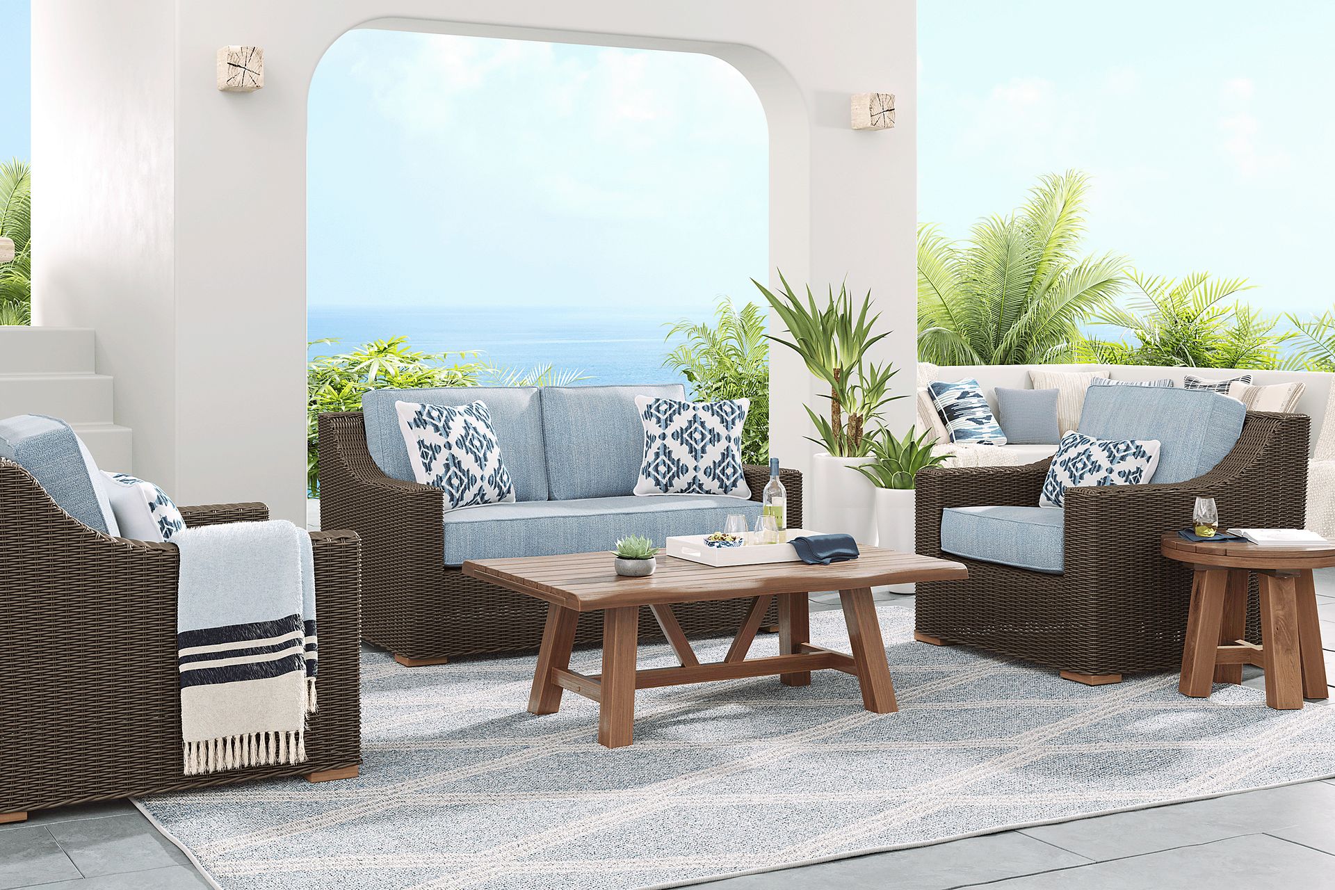 Patmos Brown 4 Pc Outdoor Loveseat Seating Set with Steel Cushions - Image 1
