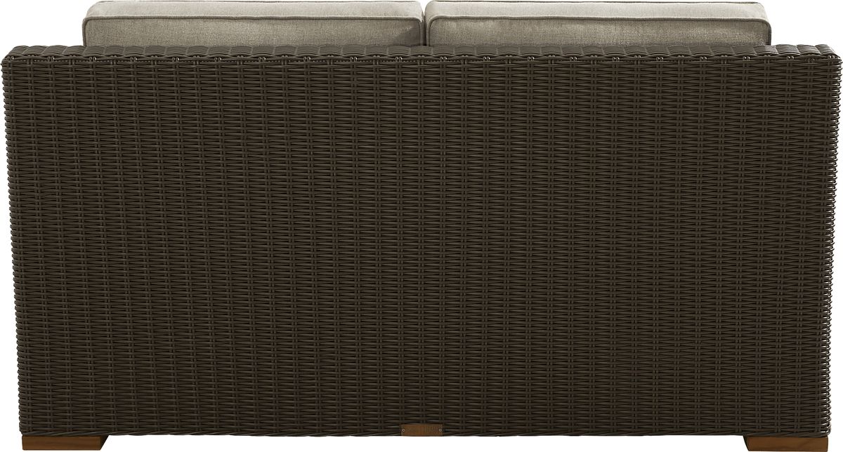 Patmos Brown Dark Wood Mushroom Wicker Outdoor Loveseat Rooms to Go