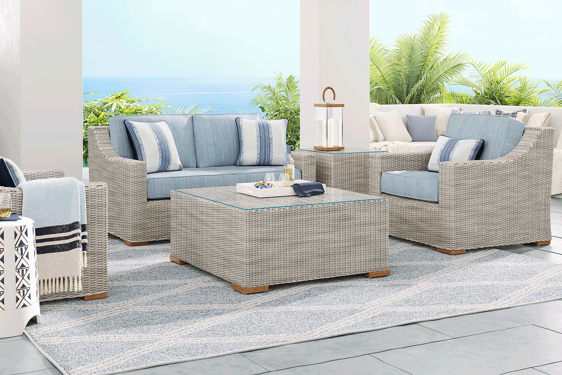 Patmos Gray 4 Pc Outdoor Loveseat Seating Set with Steel Cushions - Image 1