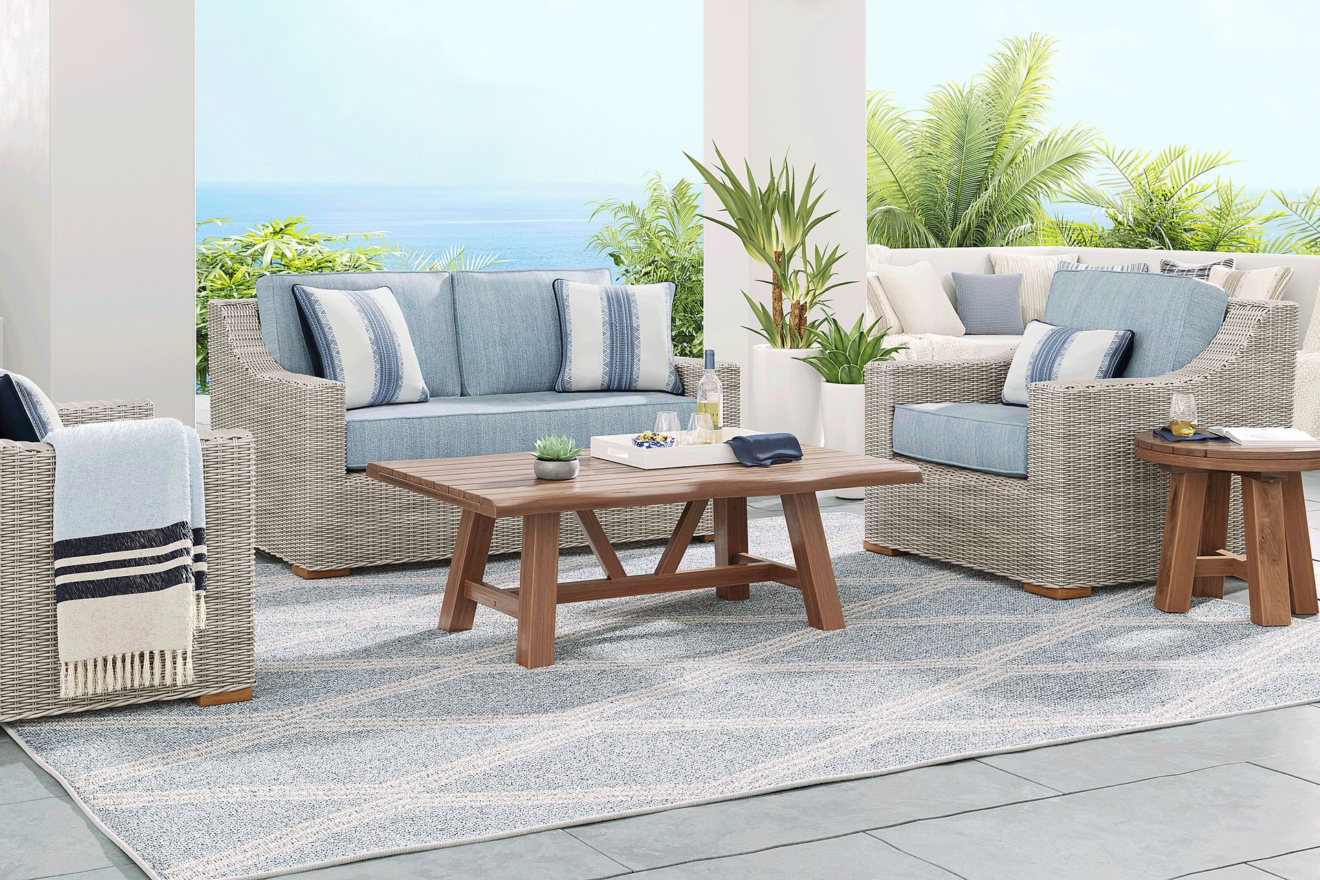 Patmos Gray 4 Pc Outdoor Loveseat Seating Set with Steel Cushions - Image 1