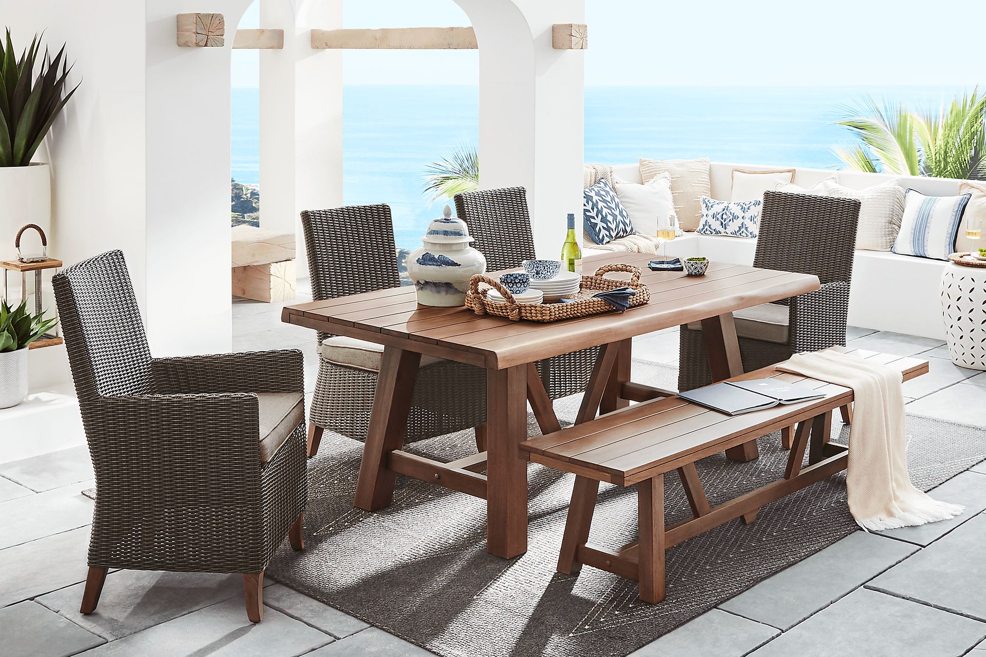 Patmos Tan 6 Pc 78 in. Rectangle Outdoor Dining Set With Mushroom Cushions - Image 1