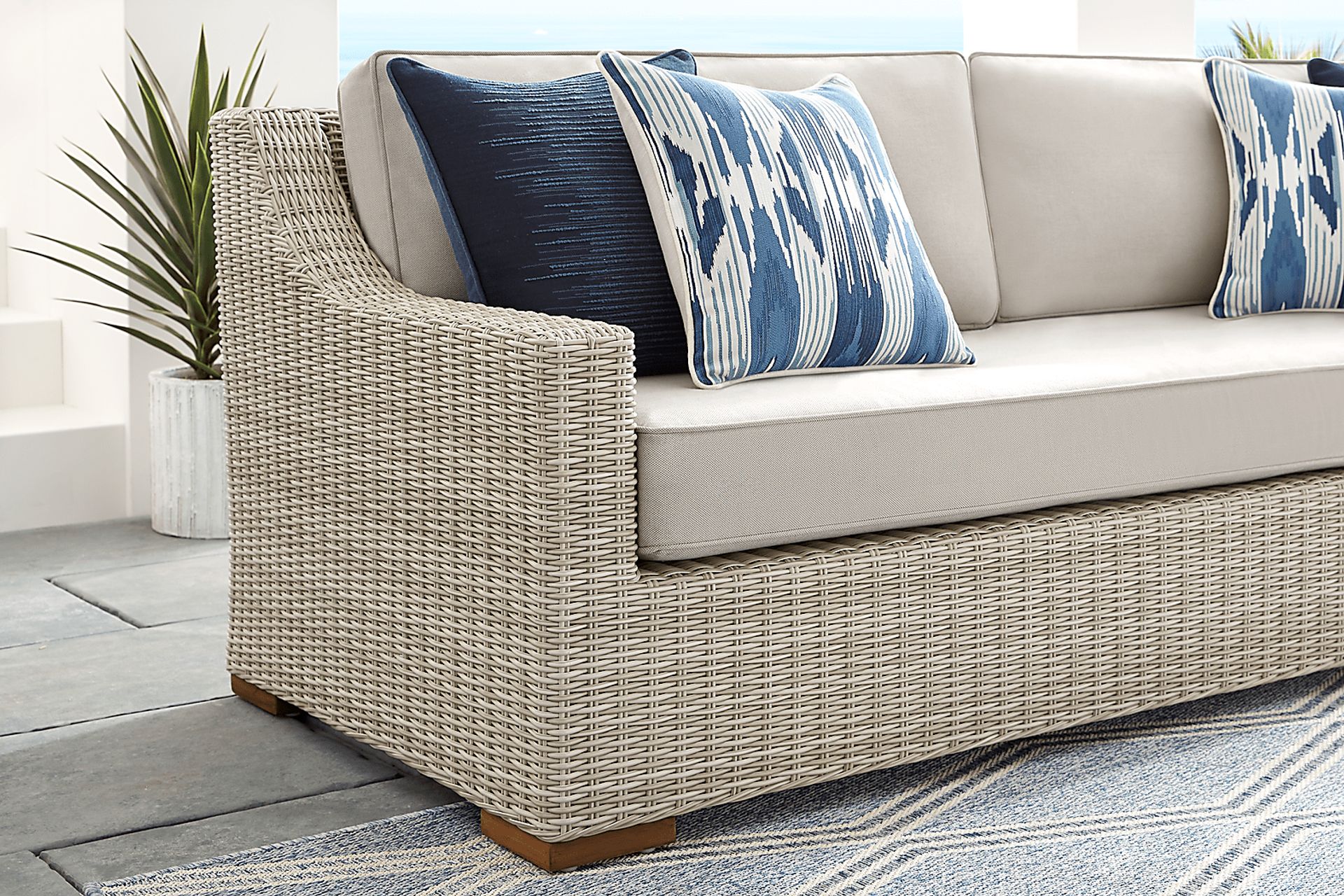 Patmos Gray Linen Beige Wicker Outdoor Sofa | Rooms to Go