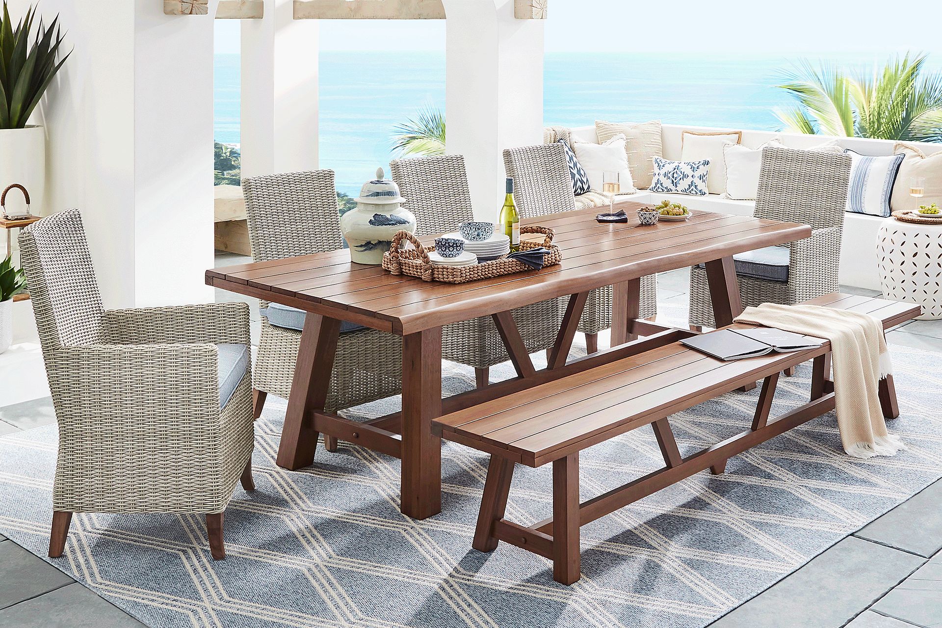 Patmos Tan 7 Pc 102 in. Rectangle Outdoor Dining Set With Steel Cushions and Bench - Image 1