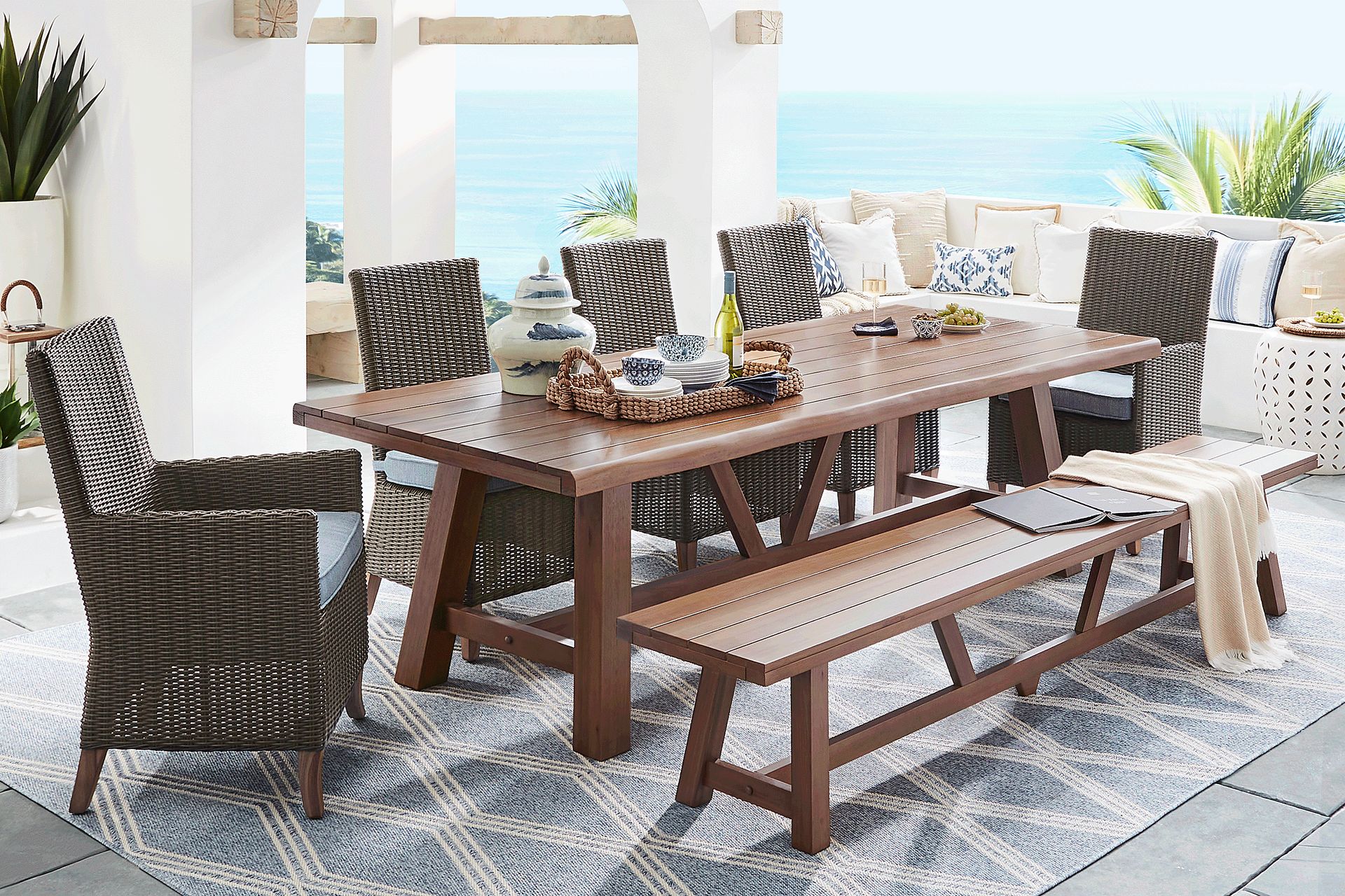 Patmos Tan 7 Pc 102 in. Rectangle Outdoor Dining Set With Steel Cushions and Bench - Image 1