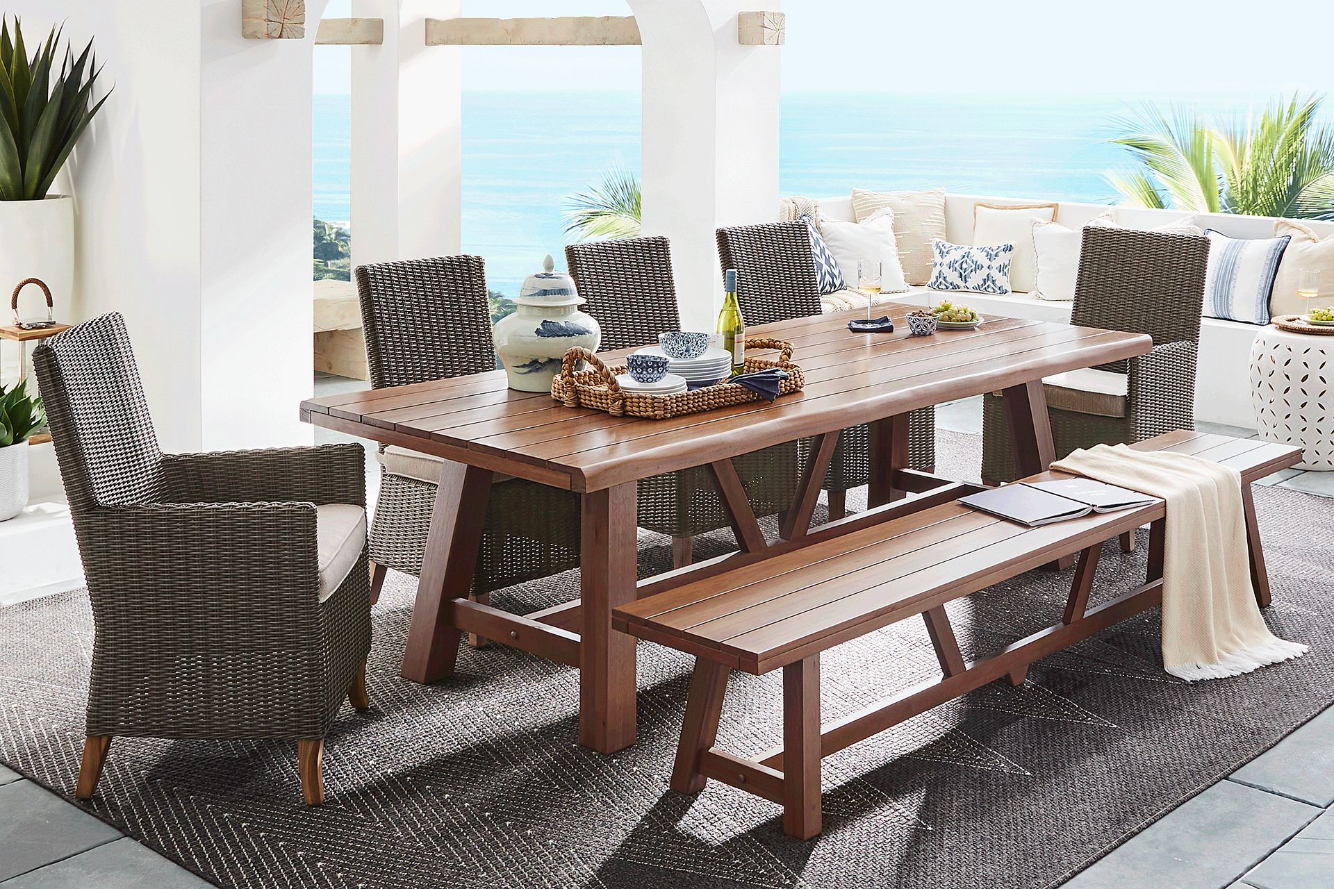 Patmos Tan 7 Pc 102 in. Rectangle Outdoor Dining Set With Twine Cushions and Bench - Image 1