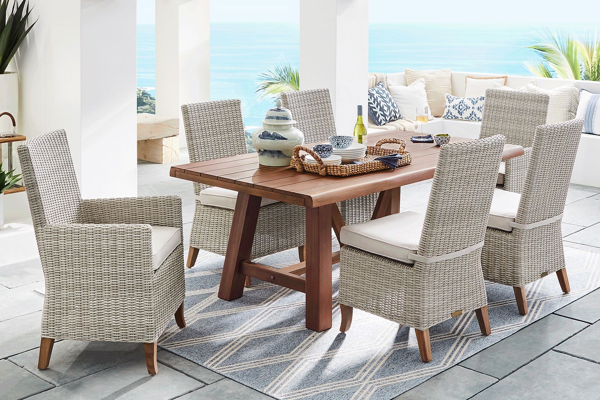 Patmos Tan 7 Pc 78 in. Rectangle Outdoor Dining Set With Linen Cushions - Image 1