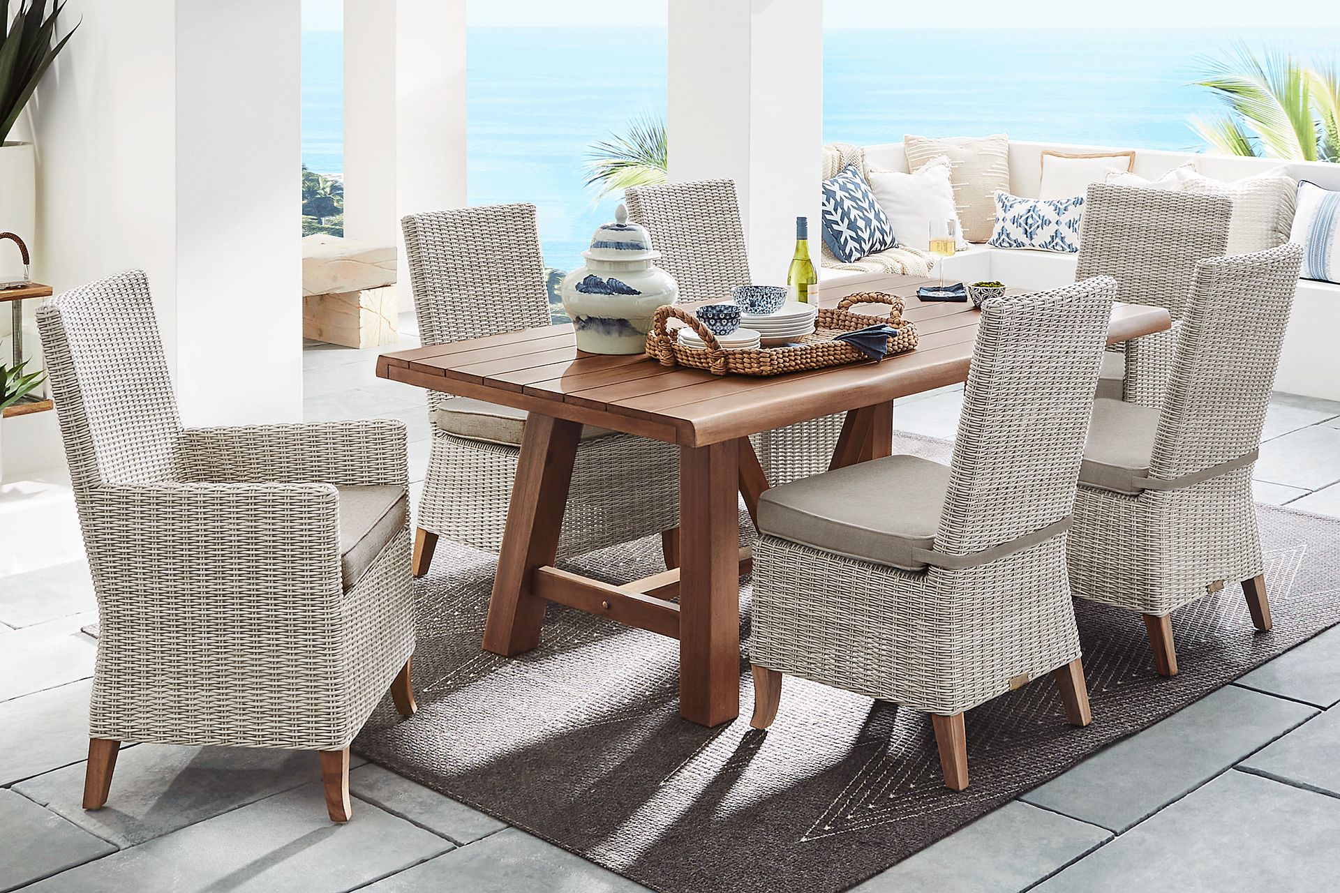 Patmos Tan 7 Pc 78 in. Rectangle Outdoor Dining Set With Mushroom Cushions - Image 1