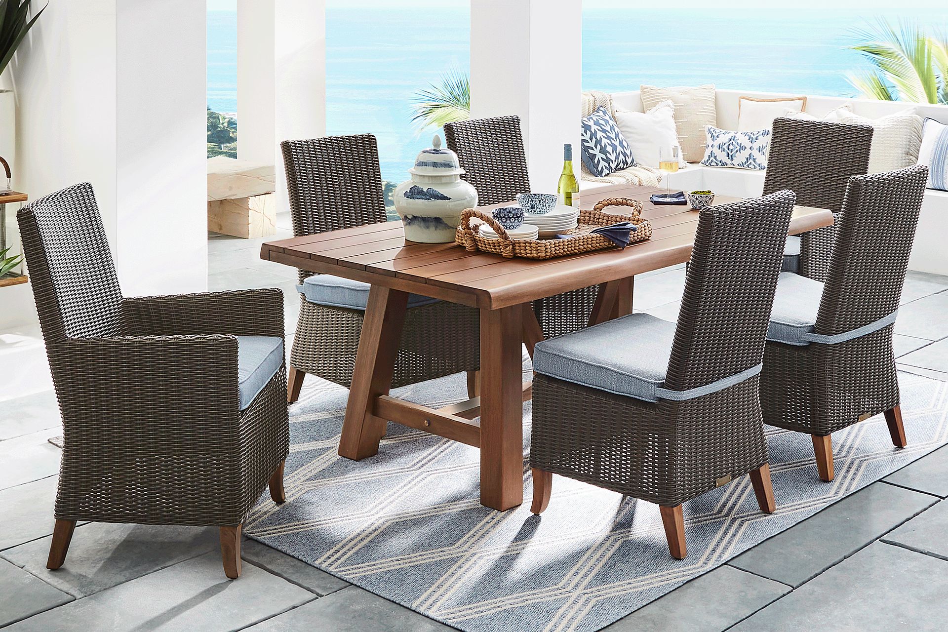Patmos Tan 7 Pc 78 in. Rectangle Outdoor Dining Set With Steel Cushions - Image 1