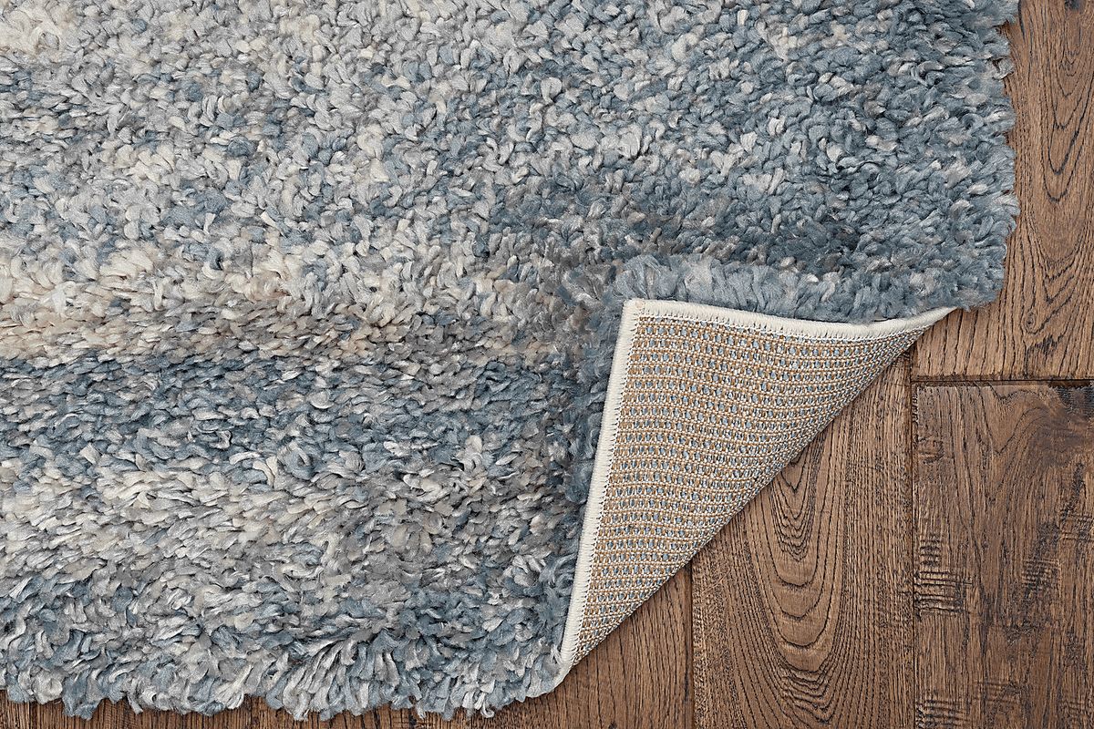 Phoenix Ivory Beige Polypropylene Fabric Rug | Rooms to Go