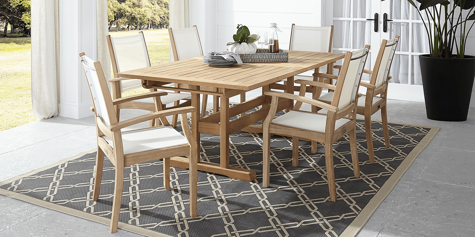 Pleasant Bay Teak 7 Pc Rectangle Extension Outdoor Dining Set - Image 1