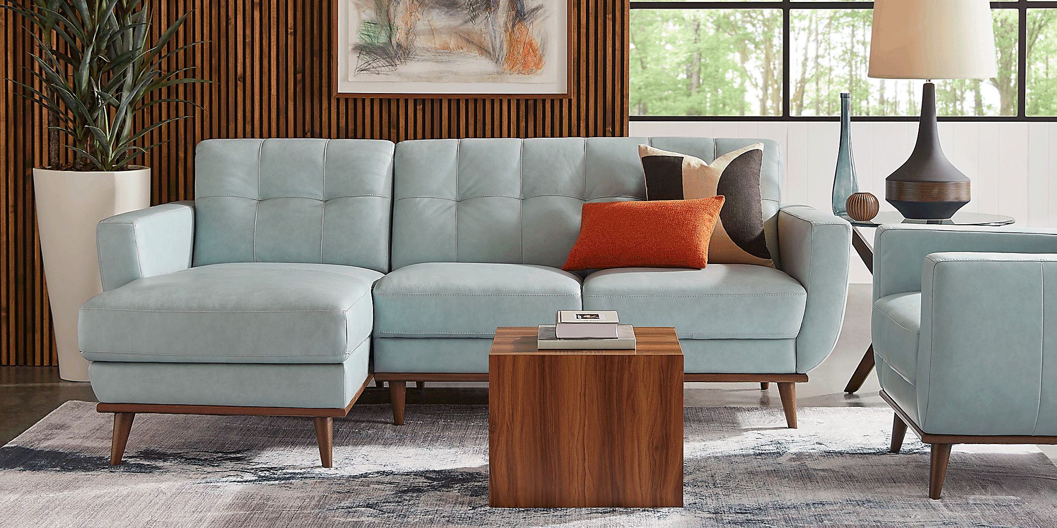 Pressly Place Sky Blue Leather 2 Pc Left Arm Chaise Sectional Rooms to Go