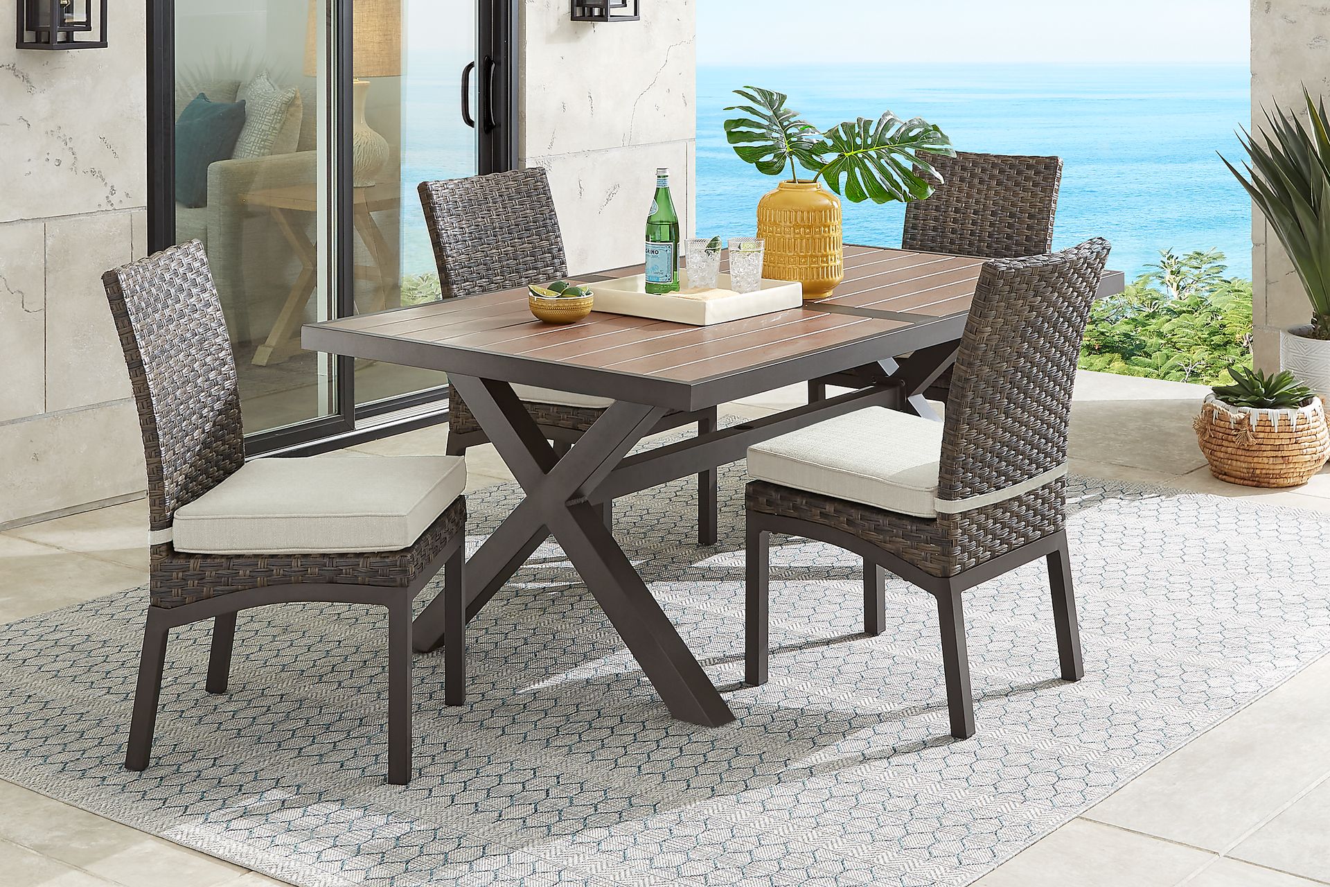 Rialto Brown 5 Pc 71 in. Rectangle Outdoor Dining Set with Putty Cushions - Image 1