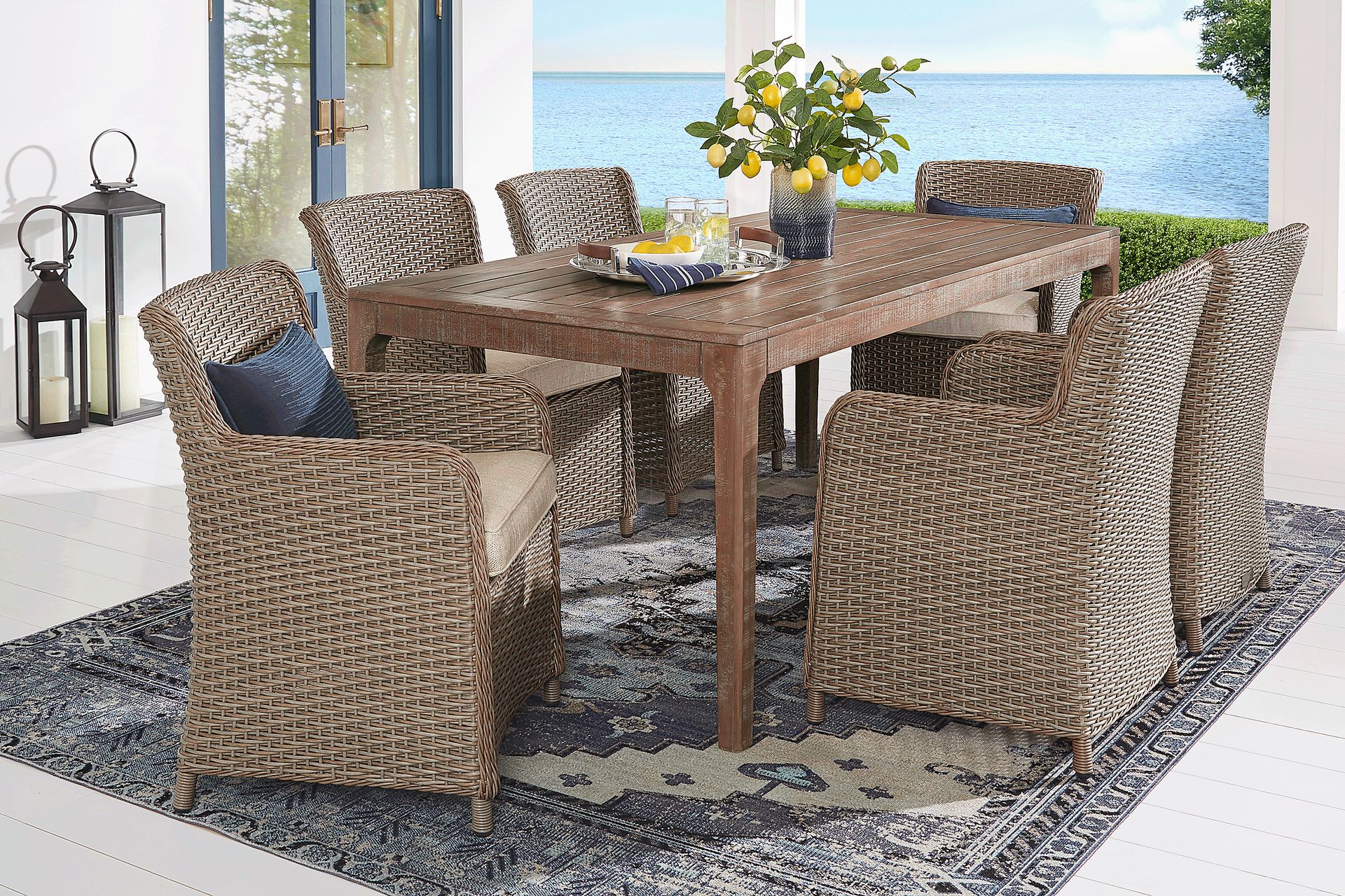 Ridgecrest Natural 7 Pc Rectangle Outdoor Dining Set With Pebble Cushions - Image 1