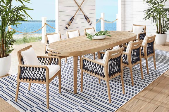 Riva Blonde 7 Pc Large Oval Outdoor Dining Set with White Cushions