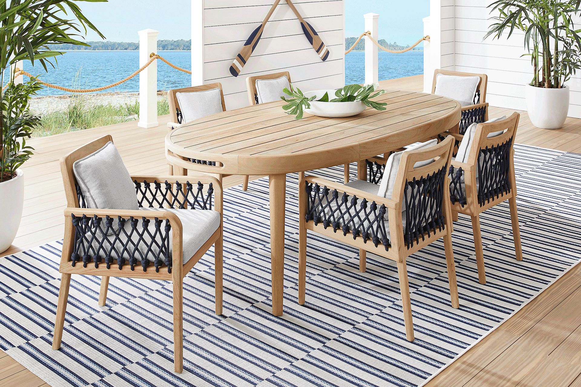 Riva Blonde 7 Pc Oval Outdoor Dining Set with Dove Cushions - Image 1