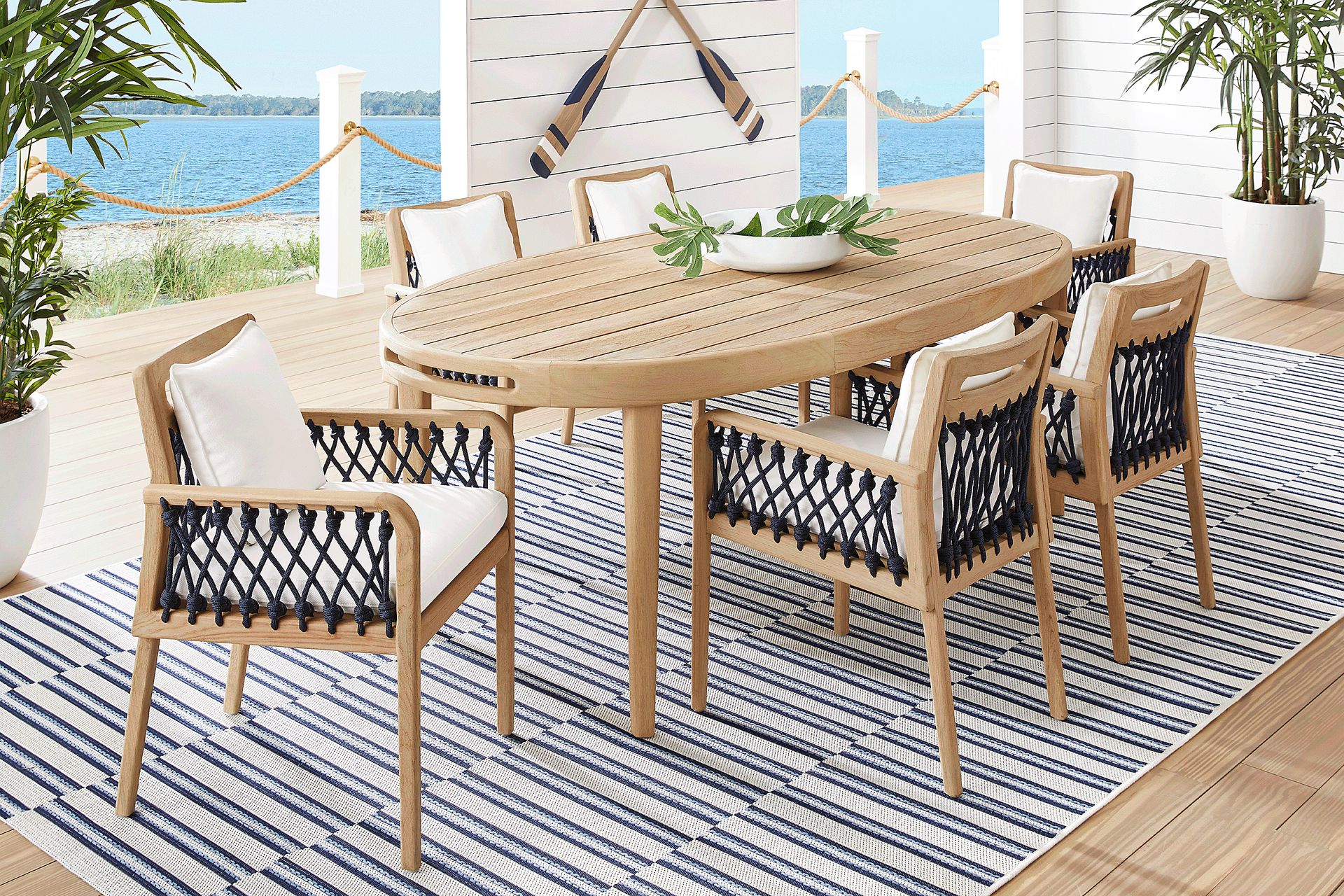Riva Blonde 7 Pc Oval Outdoor Dining Set with White Cushions - Image 1