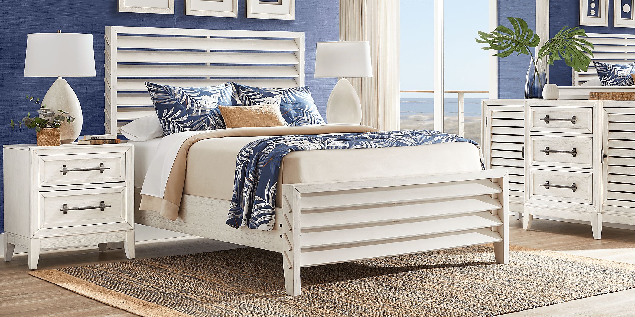 https://assets.roomstogo.com/product/river-falls-white-7-pc-king-slat-bedroom_3384744P_image-room?cache-id=54868336a22498d4374a96249a566dc1