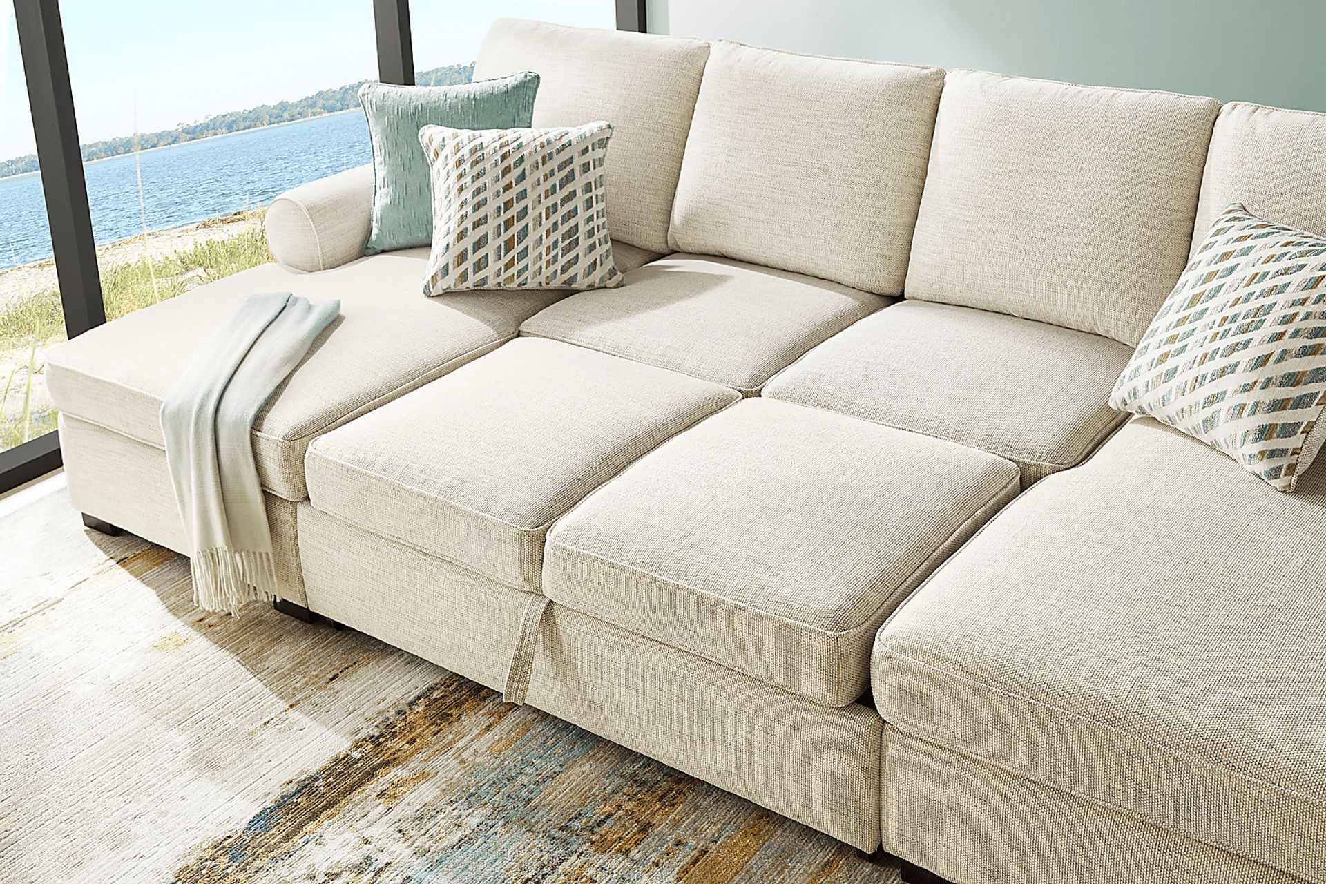 Rivera Cream 3 Pc Sleeper Sectional - Image 10
