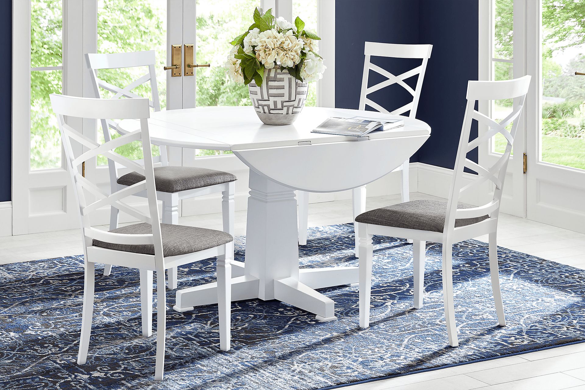 Riverdale White 5 Pc Round Dining Room with X-Back Chairs - Image 1