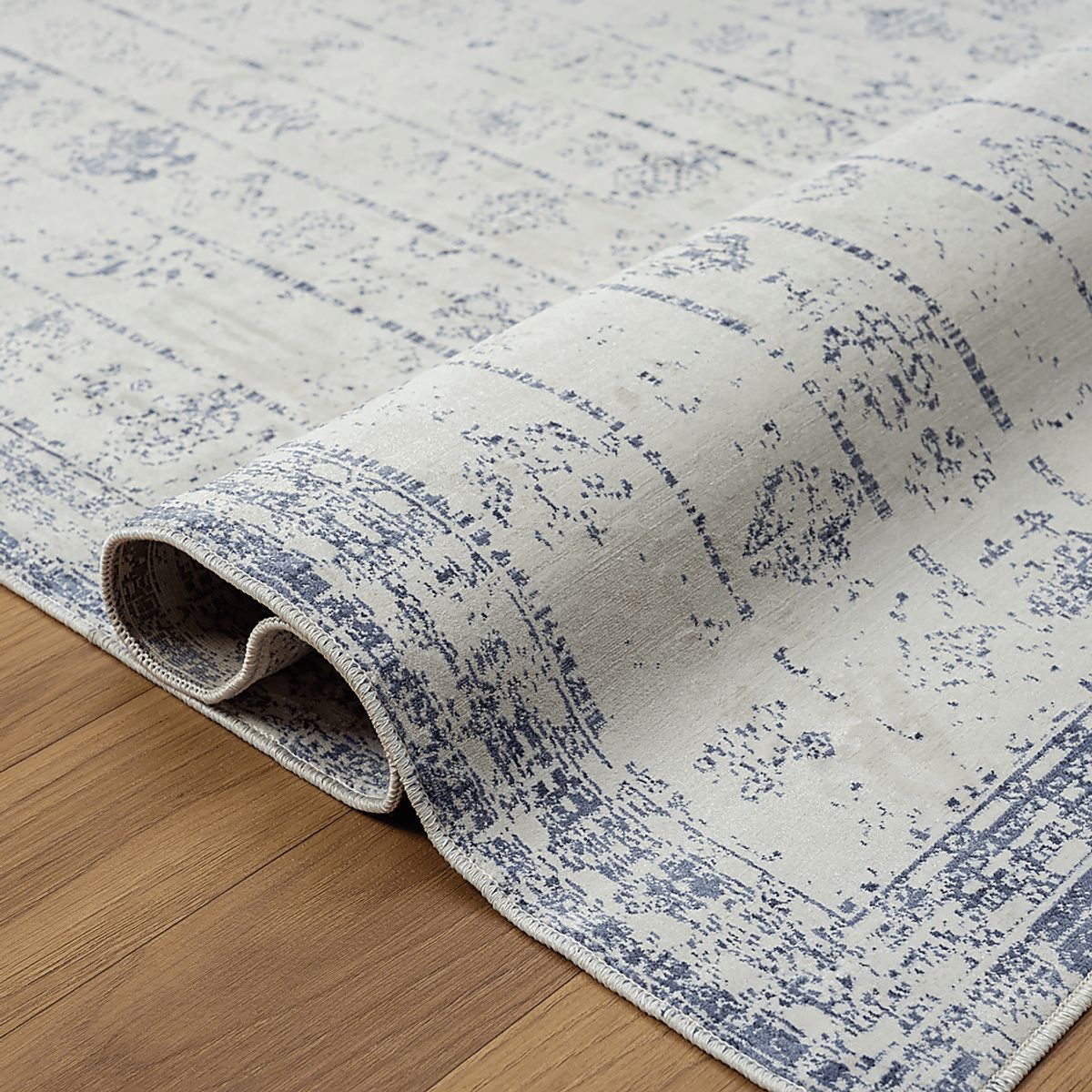 Secka Blue Rugs | Rooms to Go