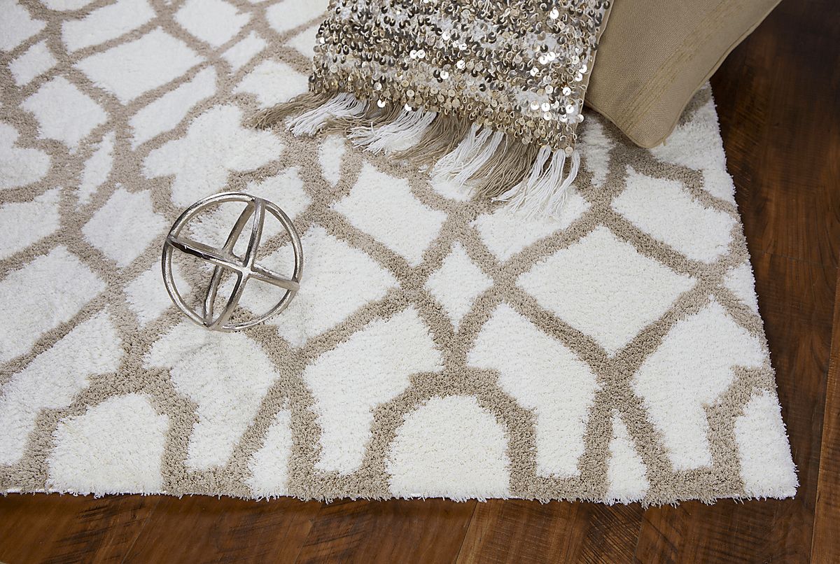 Shelnola Beige,Ivory Beige Rugs | Rooms to Go
