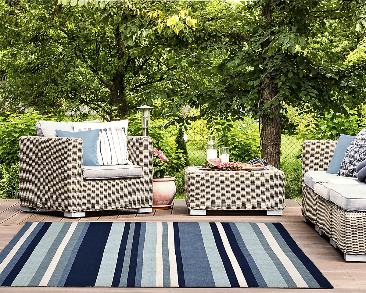 Shirnul Blue Outdoor Rugs | Rooms to Go