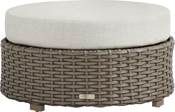 Siesta Key Driftwood Finish Round Outdoor Ottoman with Desert Cushion