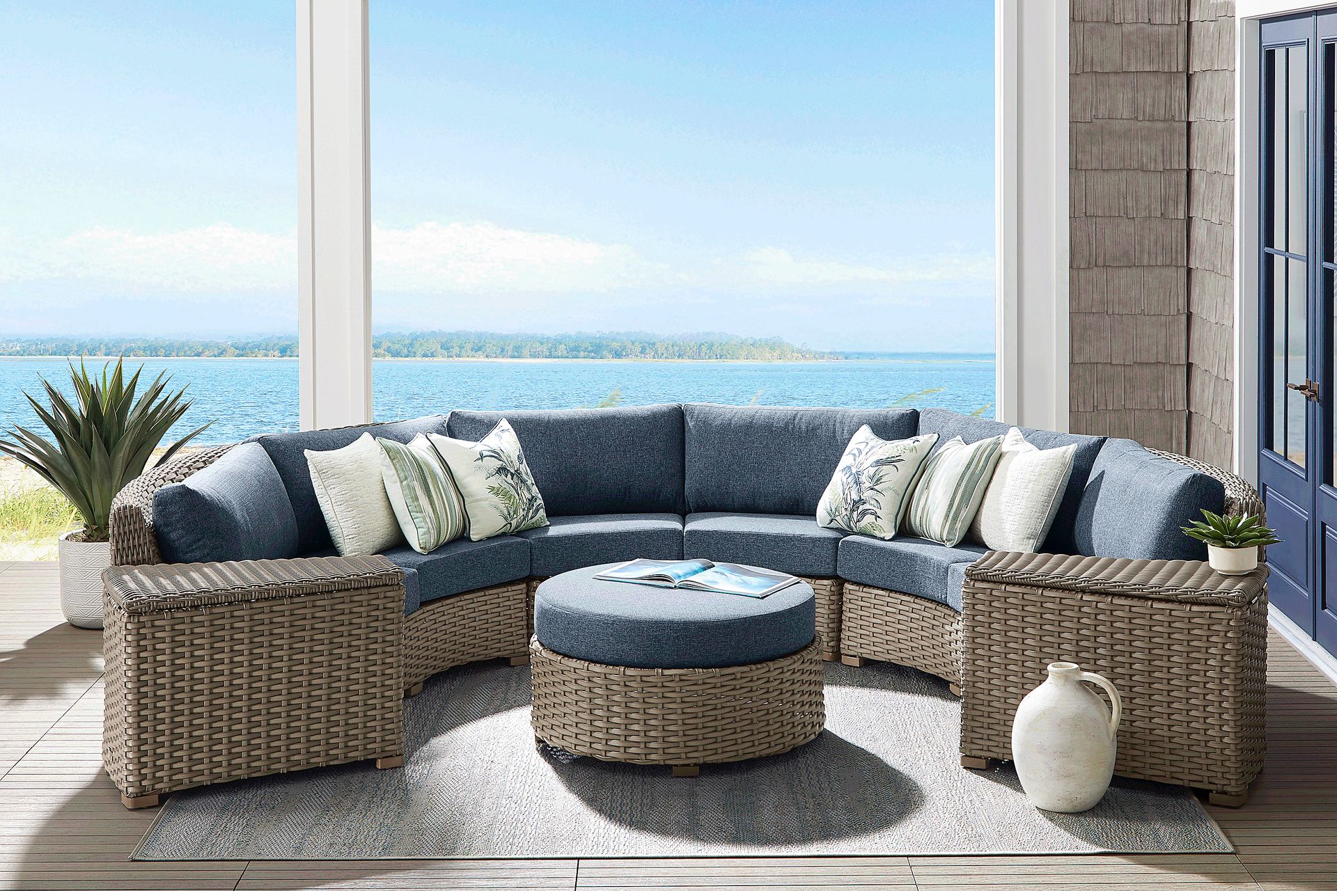 Siesta Key Driftwood Finish Round Outdoor Ottoman with Ink Cushion - Image 2