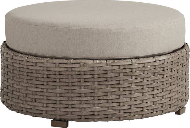 Siesta Key Driftwood Round Outdoor Ottoman with Sand Cushions - Thumbnail - Image 1