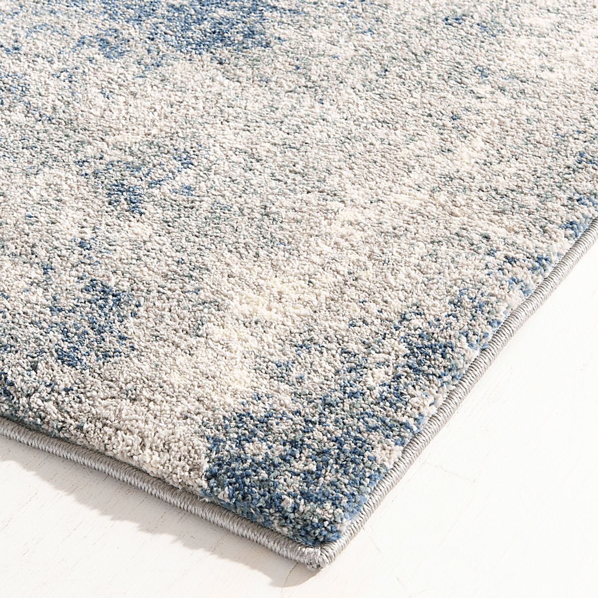 Sirena Ivory Beige Rug | Rooms to Go