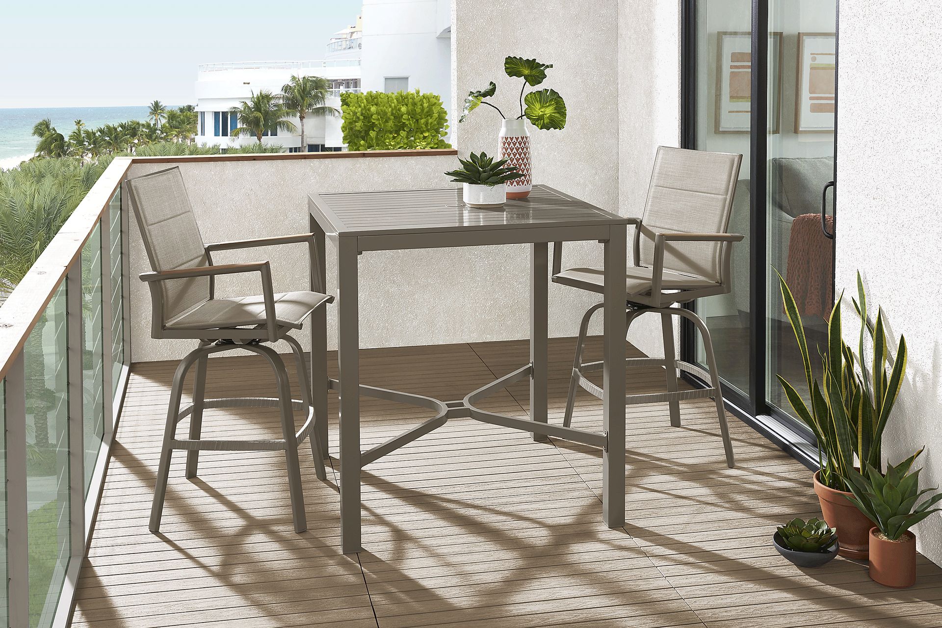 Solana Taupe 3 Pc Outdoor Bar Height Dining Set with Swivel Stools - Image 1