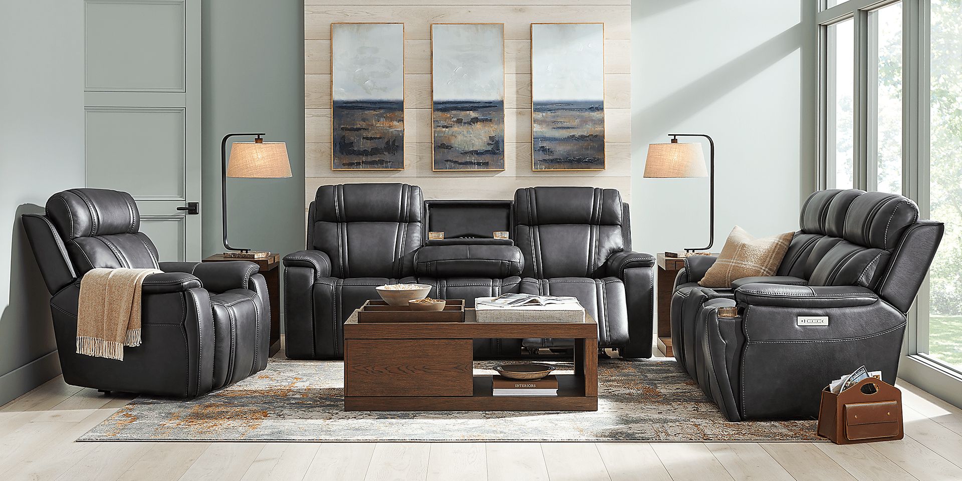 Shaq Sound Tech Black Leather Triple Power Reclining Sofa | Rooms to Go