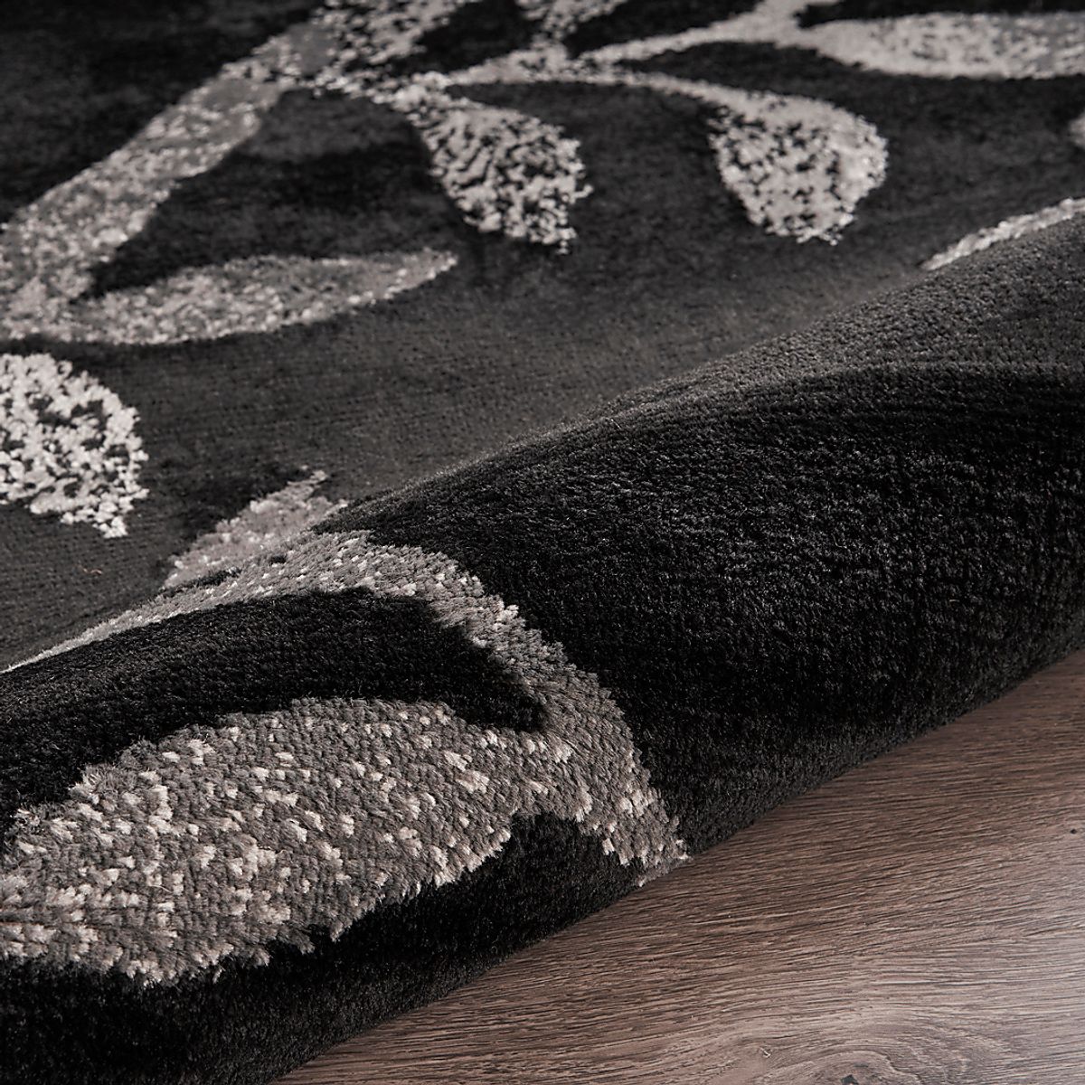 Storleah Black Rug | Rooms to Go
