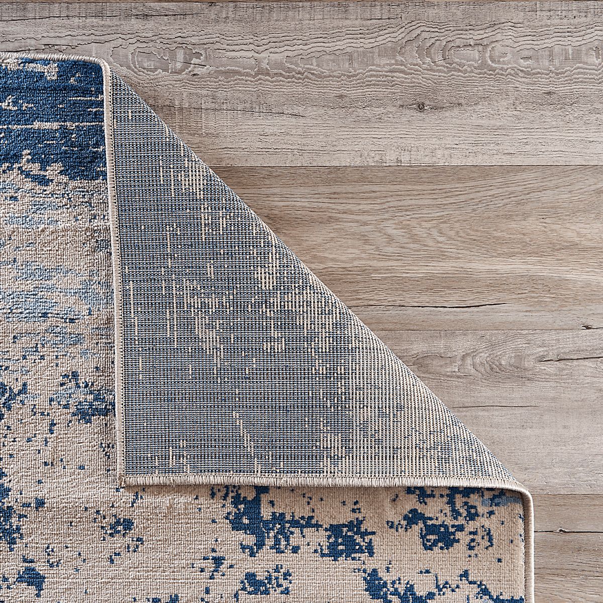 Stynas Blue Rug | Rooms to Go